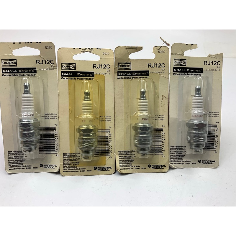 (4) Champion RJ12C Small Engine Spark Plug Copper Plus 592