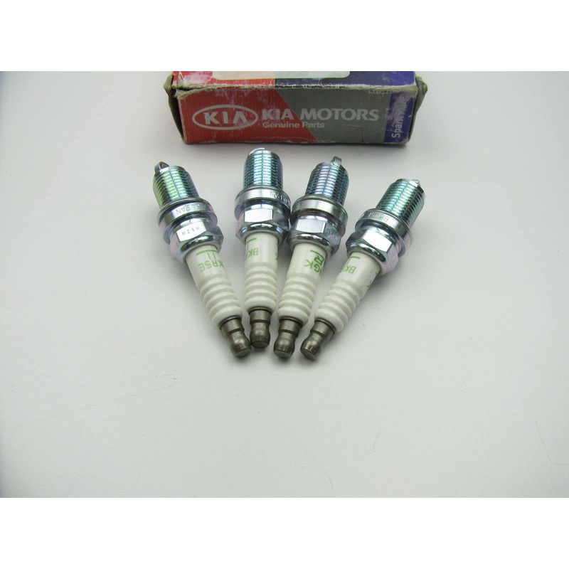 (4) New Genuine Spark Plugs OEM For 94-97 KIA Sephia, 97-02 Sportage 0K23A18110